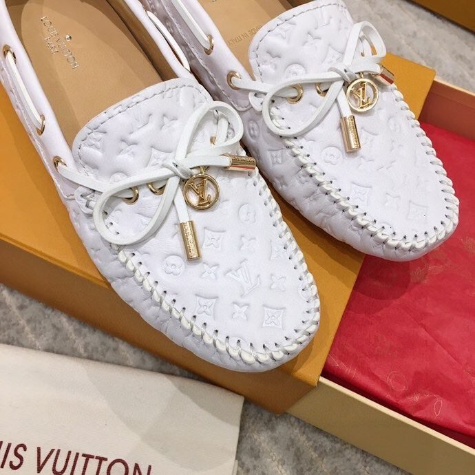 LOUIS VUITTON LV WOMEN'S DRIVER MOCCASIN IN WHITE EMBOSSED CALFSKIN