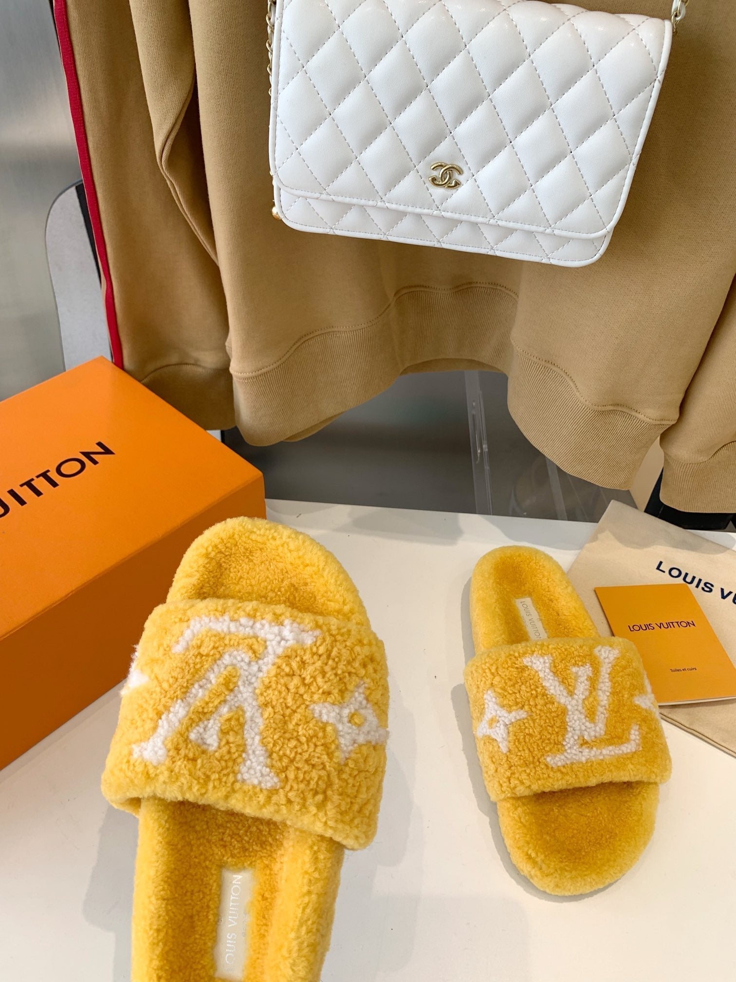 LOUIS VUITTON LV WOMEN'S PASEO FLAT SLIPPER IN YELLOW FLEECE WITH WHITE LOGO