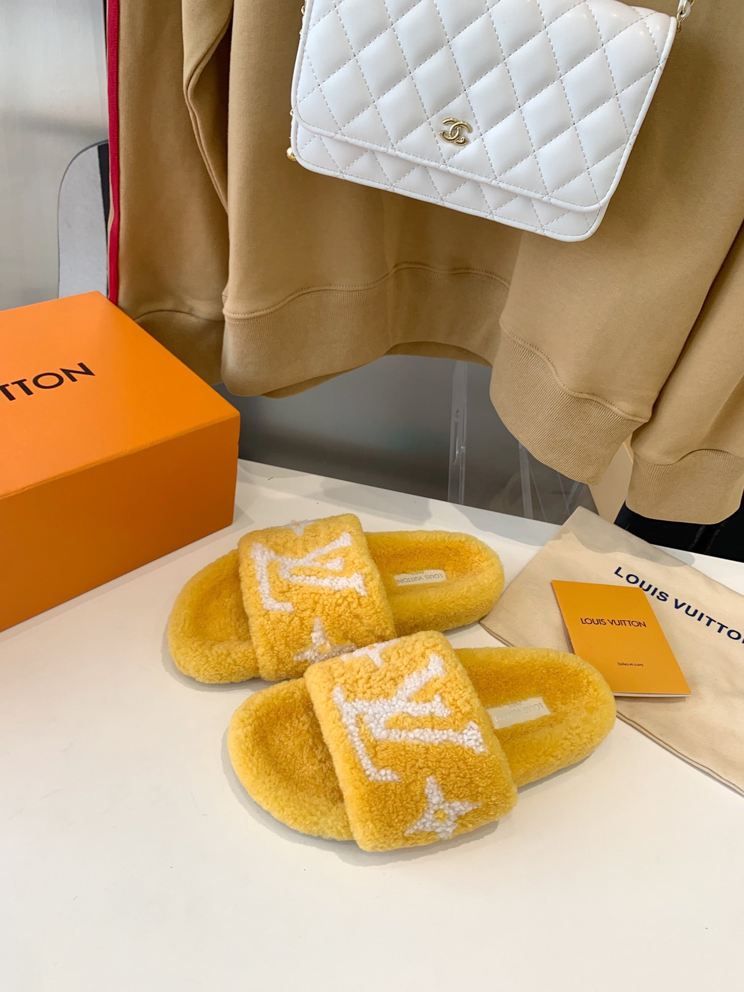 LOUIS VUITTON LV WOMEN'S PASEO FLAT SLIPPER IN YELLOW FLEECE WITH WHITE LOGO