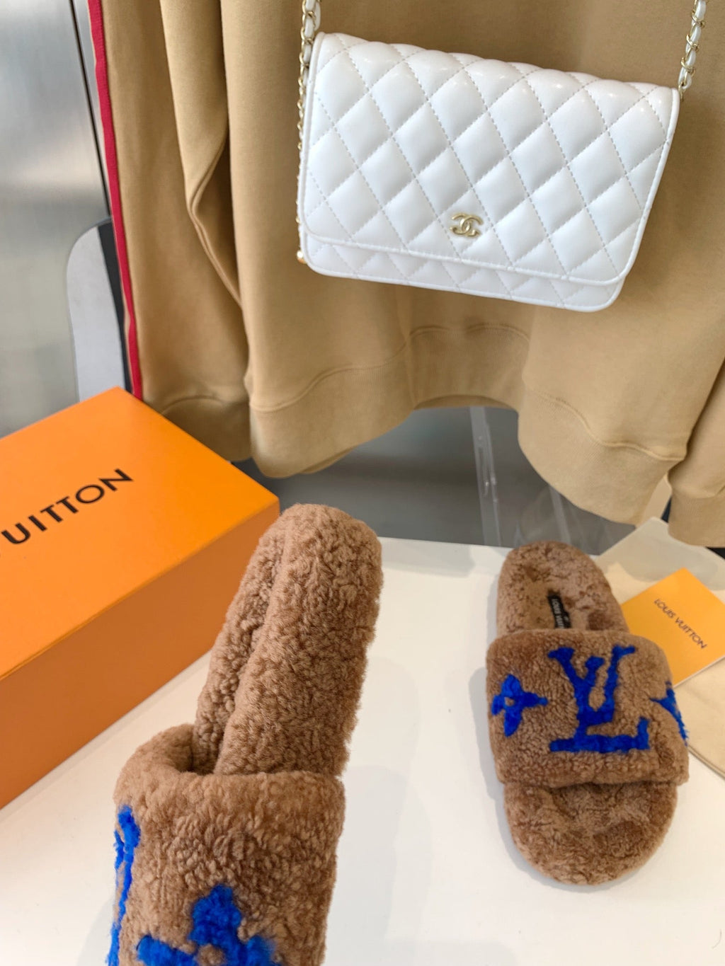 LOUIS VUITTON LV WOMEN'S PASEO FLAT SLIPPER IN BROWN FLEECE WITH BLUE LOGO
