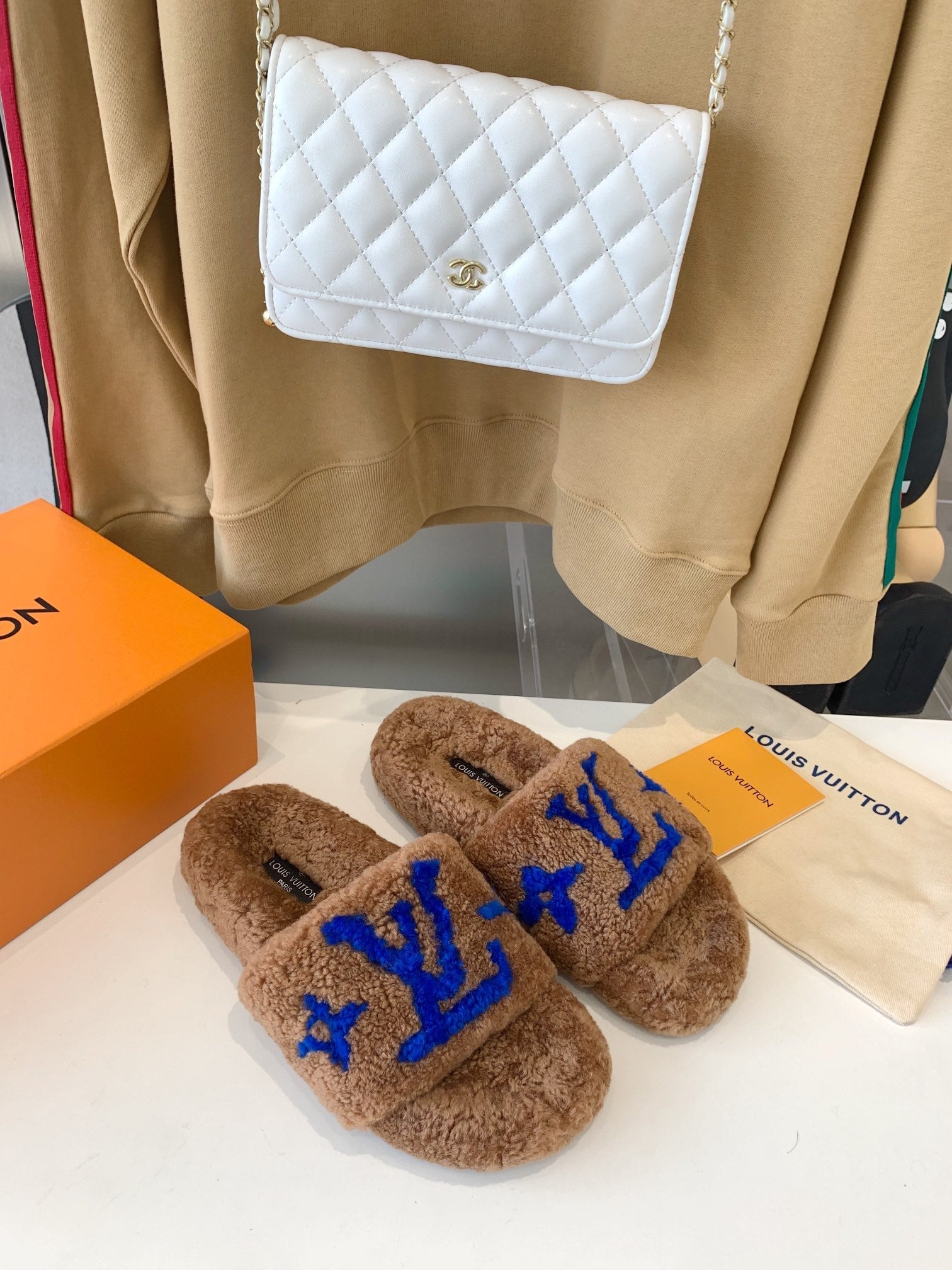 LOUIS VUITTON LV WOMEN'S PASEO FLAT SLIPPER IN BROWN FLEECE WITH BLUE LOGO