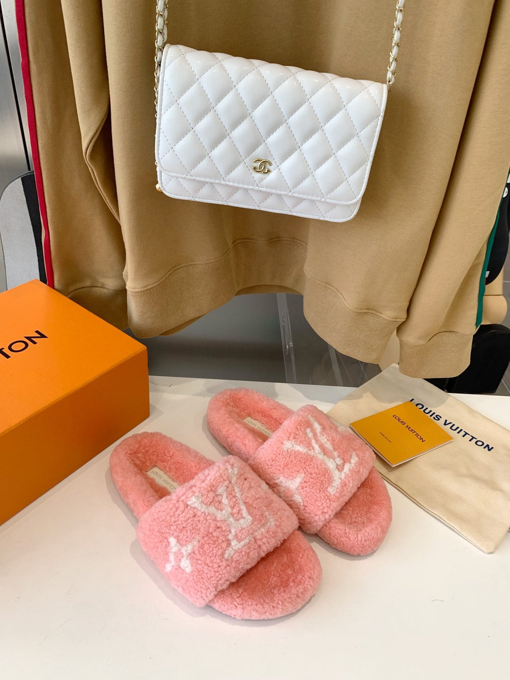 LOUIS VUITTON LV WOMEN'S PASEO FLAT SLIPPER IN LIGHT PINK FLEECE WITH WHITE LOGO