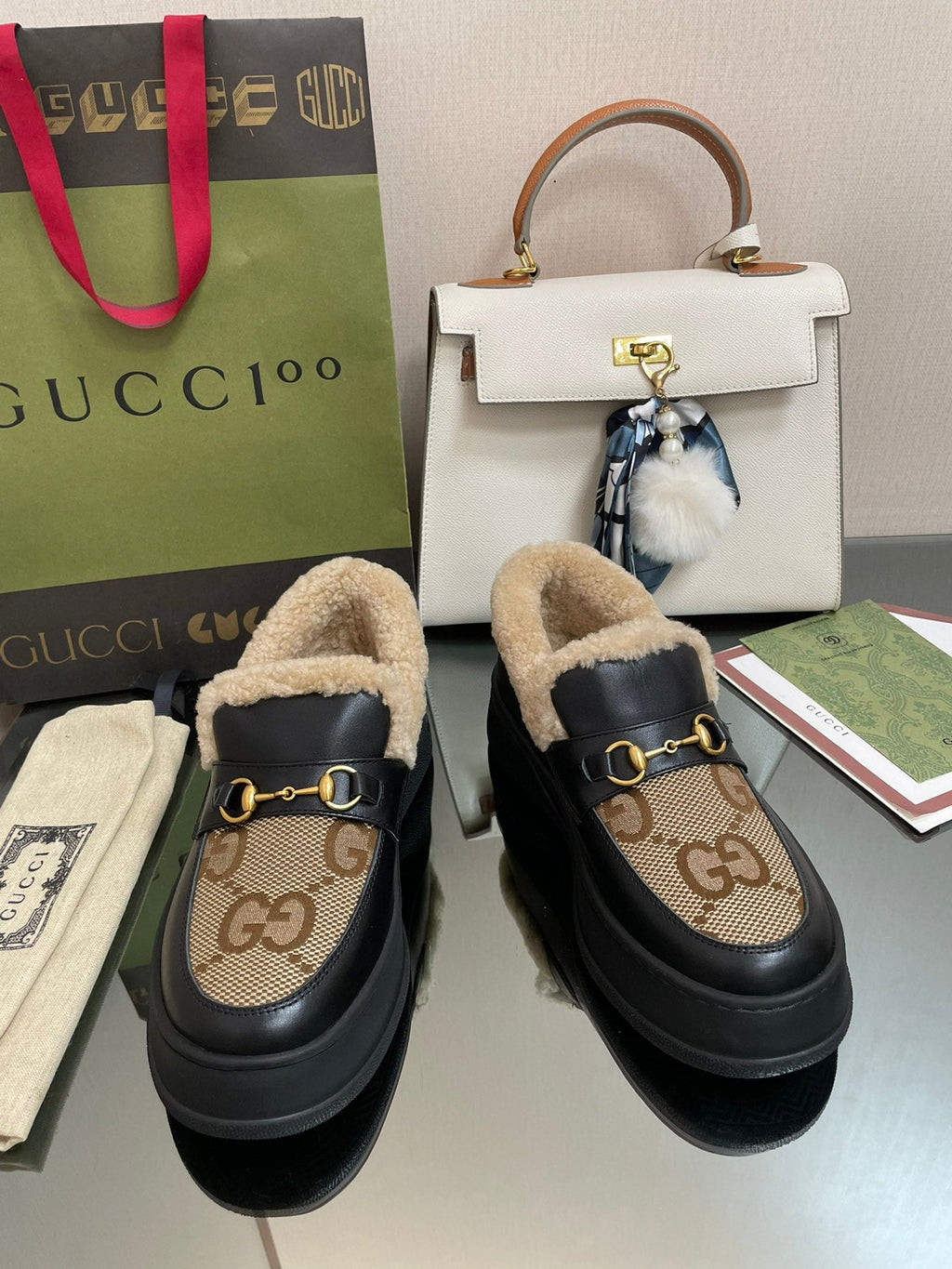 GUCCI LOAFER IN PEANUT BROWN JACQUARD AND BLACK CALFSKIN WITH BEIGE WOOL LINING