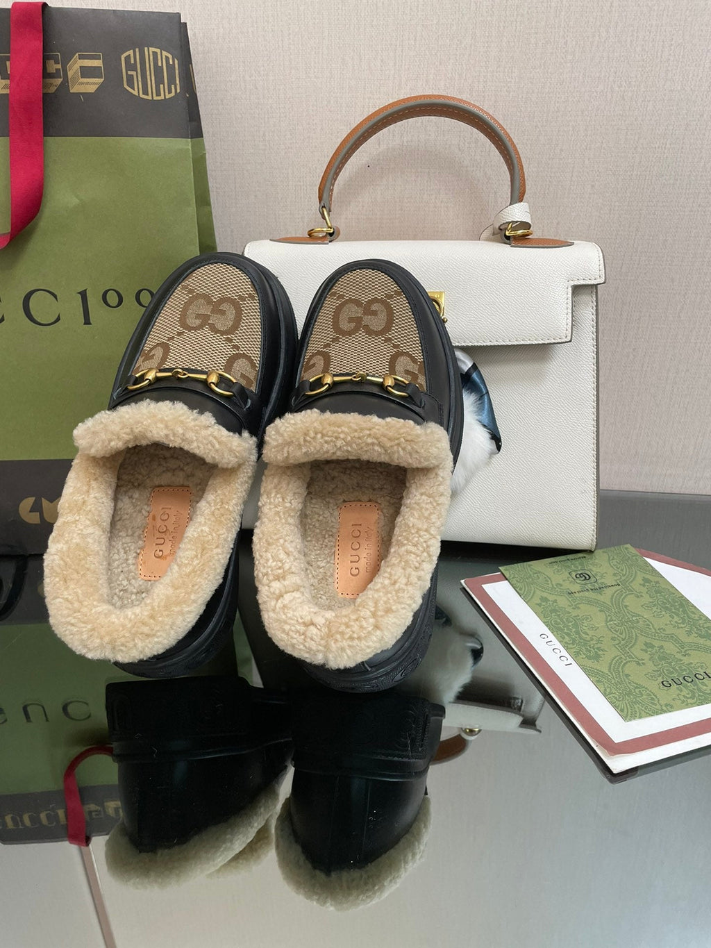 GUCCI LOAFER IN PEANUT BROWN JACQUARD AND BLACK CALFSKIN WITH BEIGE WOOL LINING