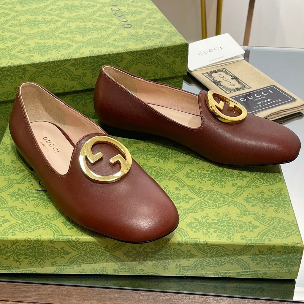 GUCCI BLONDIE LOGO-PLAQUE LOAFERS IN SYRUP BROWN CALFSKIN WITH GOLD HARDWARE