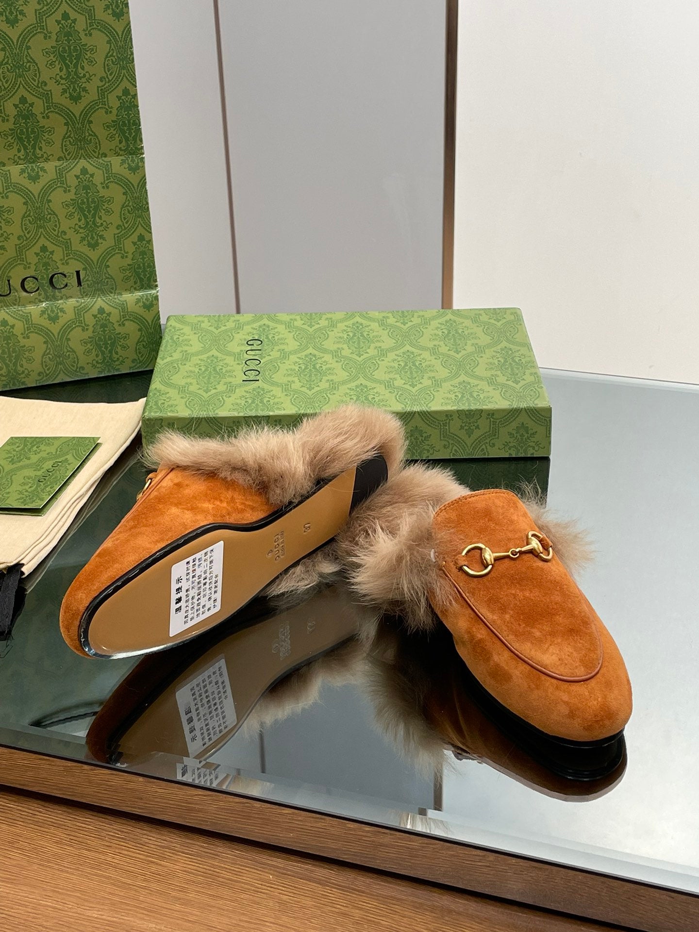 GUCCI HORSEBIT MULE IN BRONZE ORANGE SUEDE AND LAMB WOOL LINING