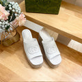 GUCCI HIGH 10CM WEDGE SANDALS IN WHITE SHEEPSKIN