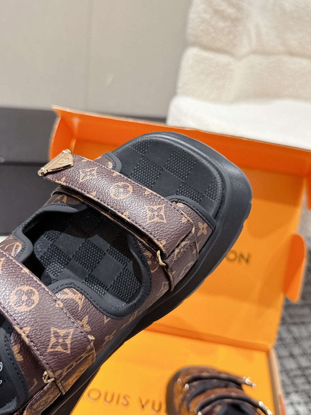 LOUIS VUITTON LV WEDGE SANDALS 25S 55 MM IN BROWN AND BLACK CALFSKIN WITH LOGO PATTERN