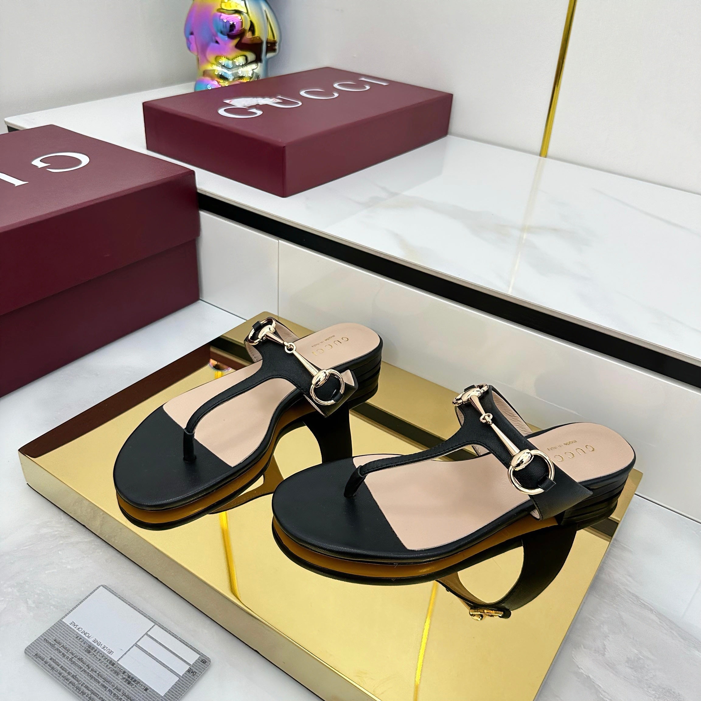 GUCCI THONG SANDALS IN BLACK LAMBSKIN WITH GOLD HARDWARE