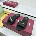 GUCCI SLIDES IN BLACK WITH GOLD HARDWARE