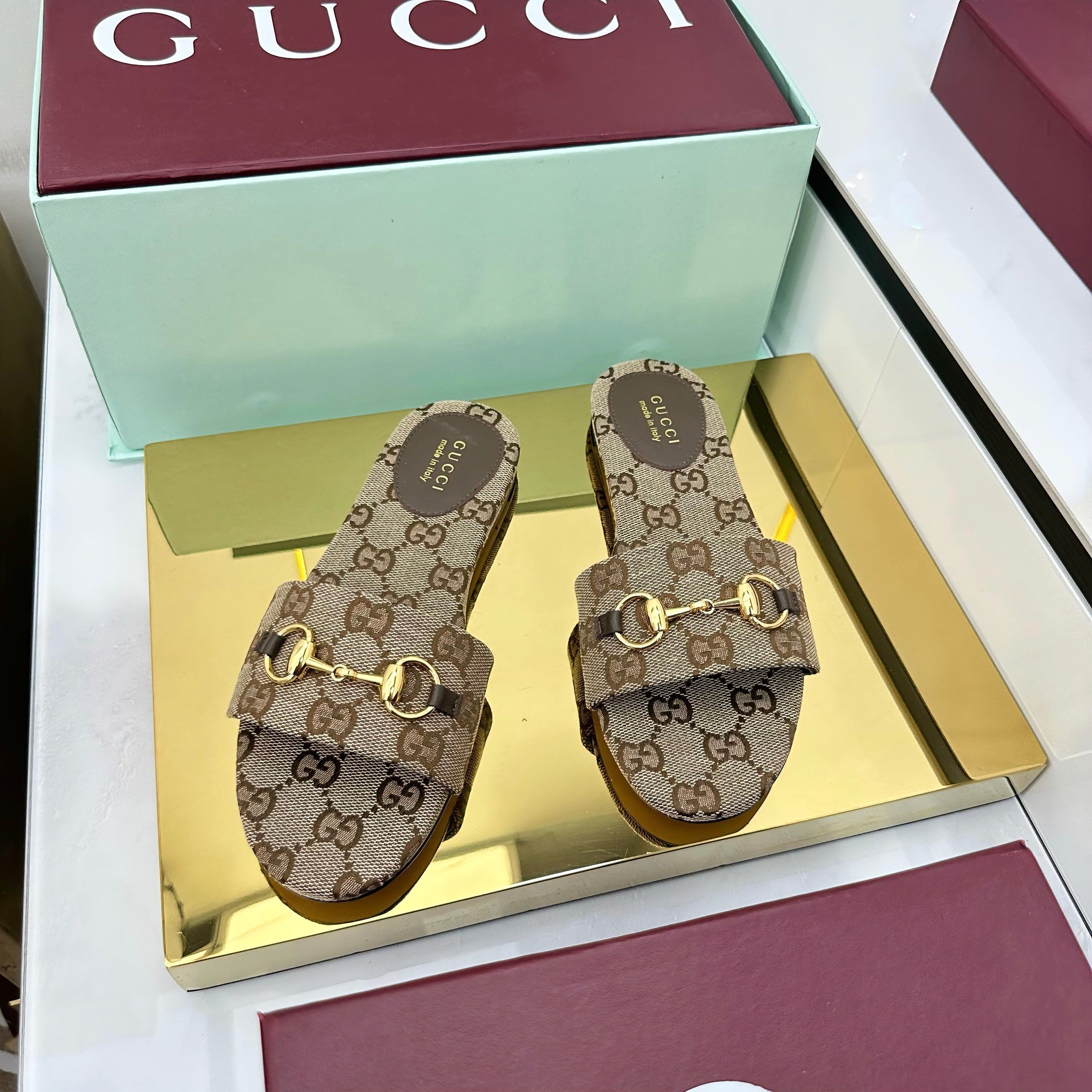 GUCCI SLIDES IN DARK BEIGE WITH GOLD HARDWARE