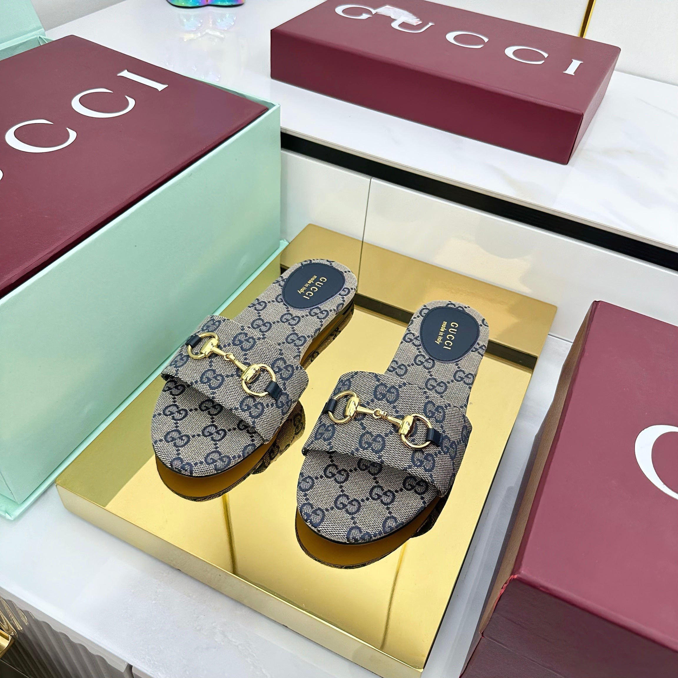 GUCCI SLIDES IN STONE GREY WITH GOLD HARDWARE