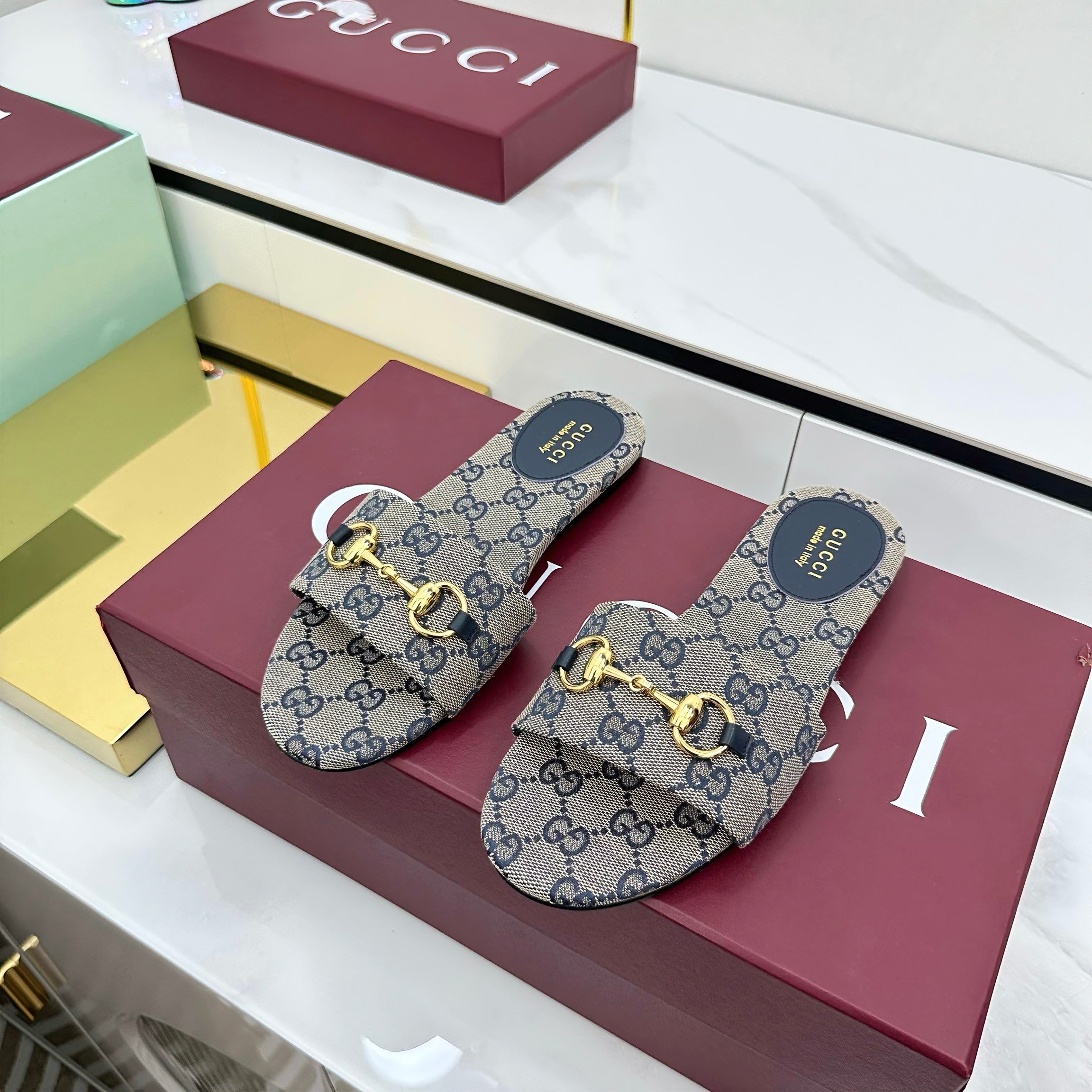 GUCCI SLIDES IN STONE GREY WITH GOLD HARDWARE