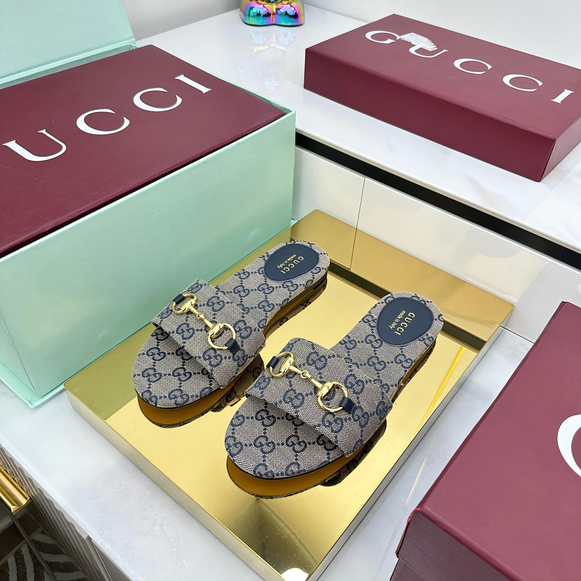 GUCCI SLIDES IN STONE GREY WITH GOLD HARDWARE
