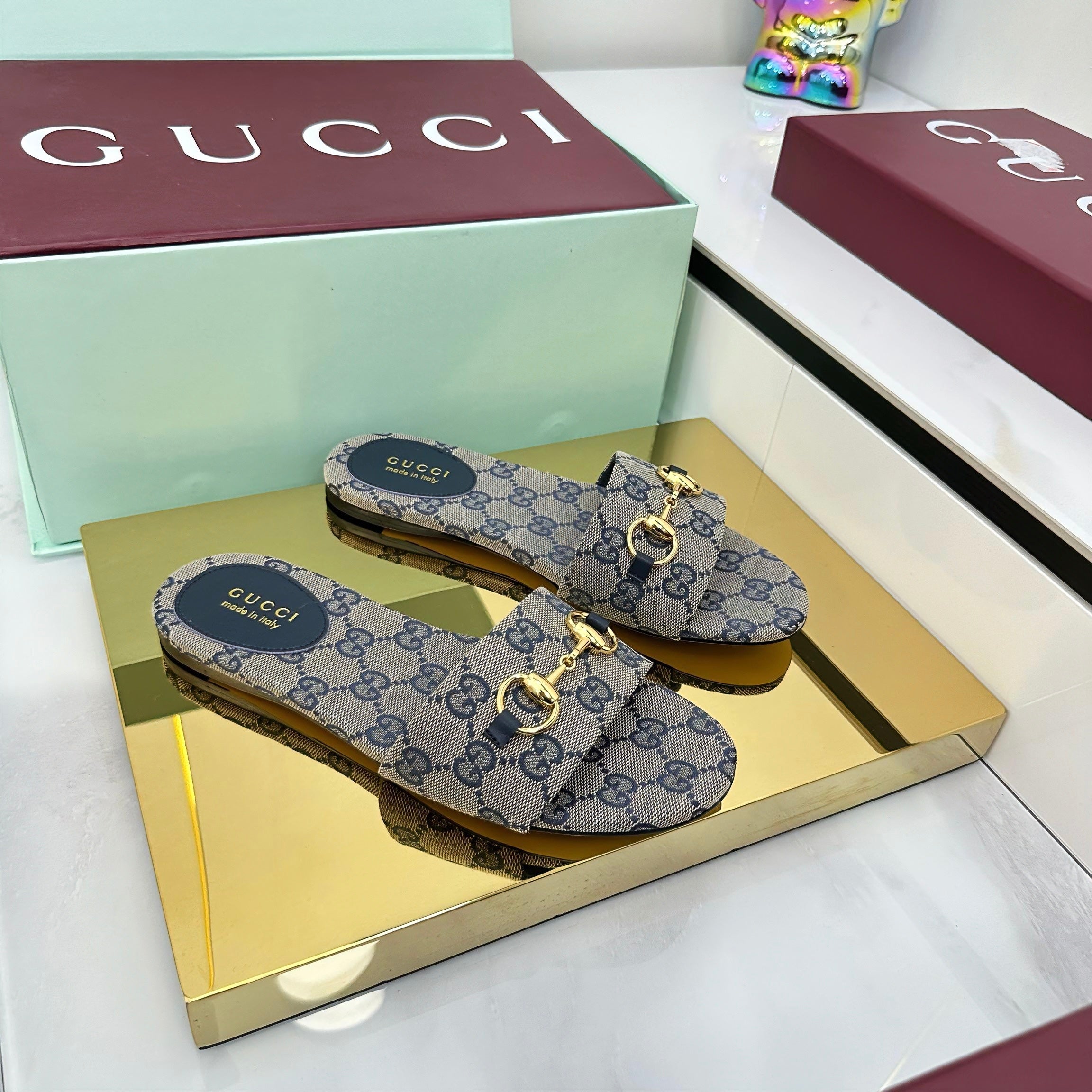GUCCI SLIDES IN STONE GREY WITH GOLD HARDWARE