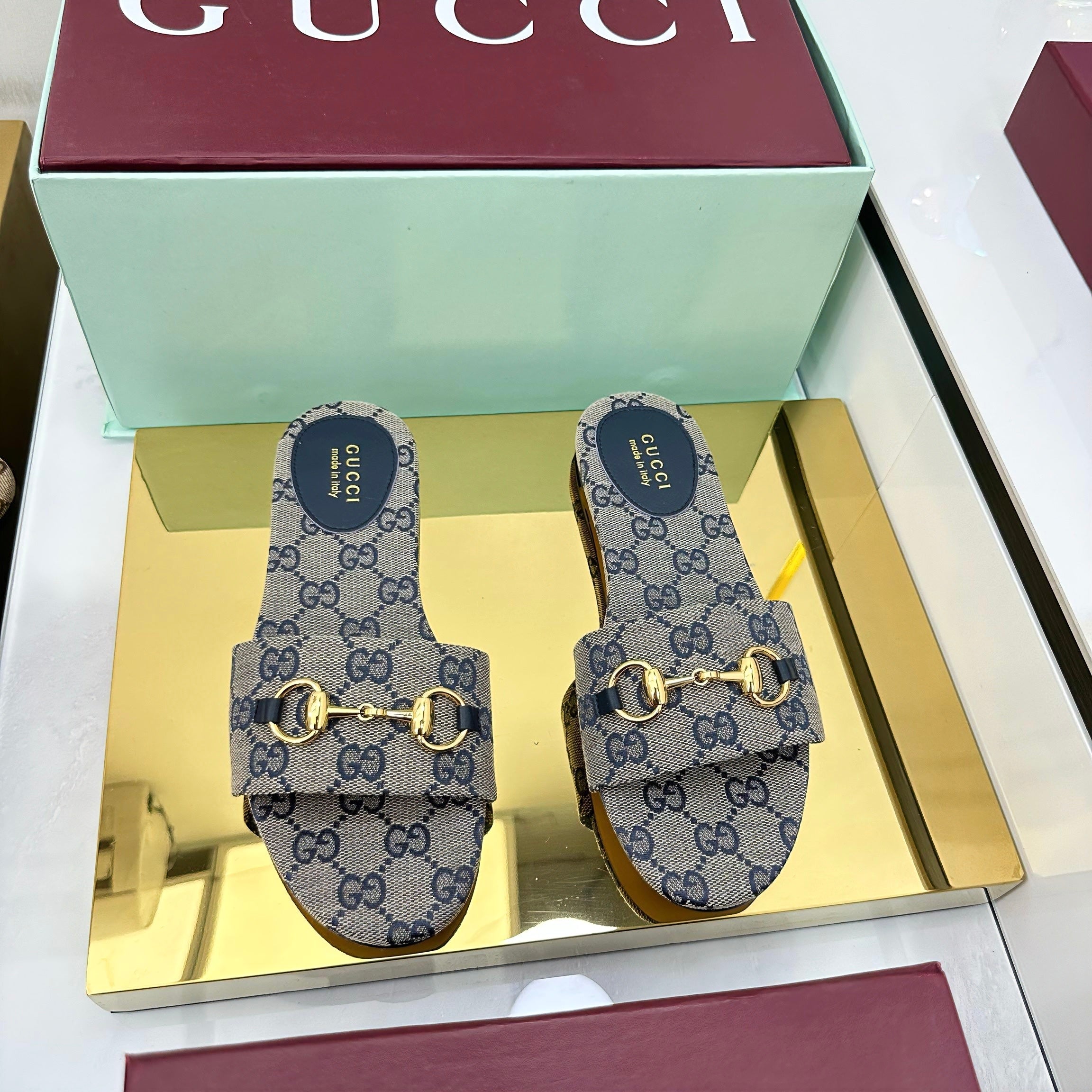 GUCCI SLIDES IN STONE GREY WITH GOLD HARDWARE
