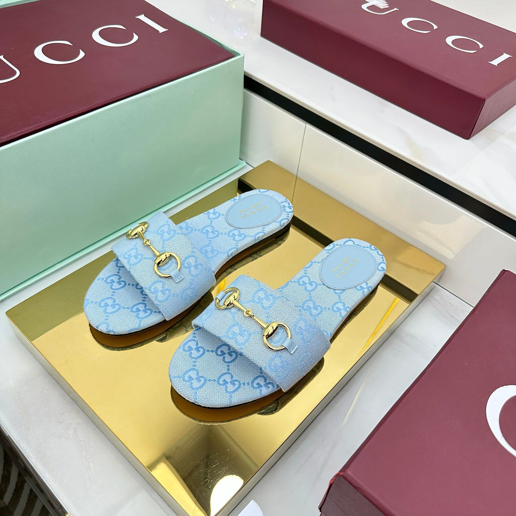 GUCCI SLIDES IN BLUE WITH GOLD HARDWARE