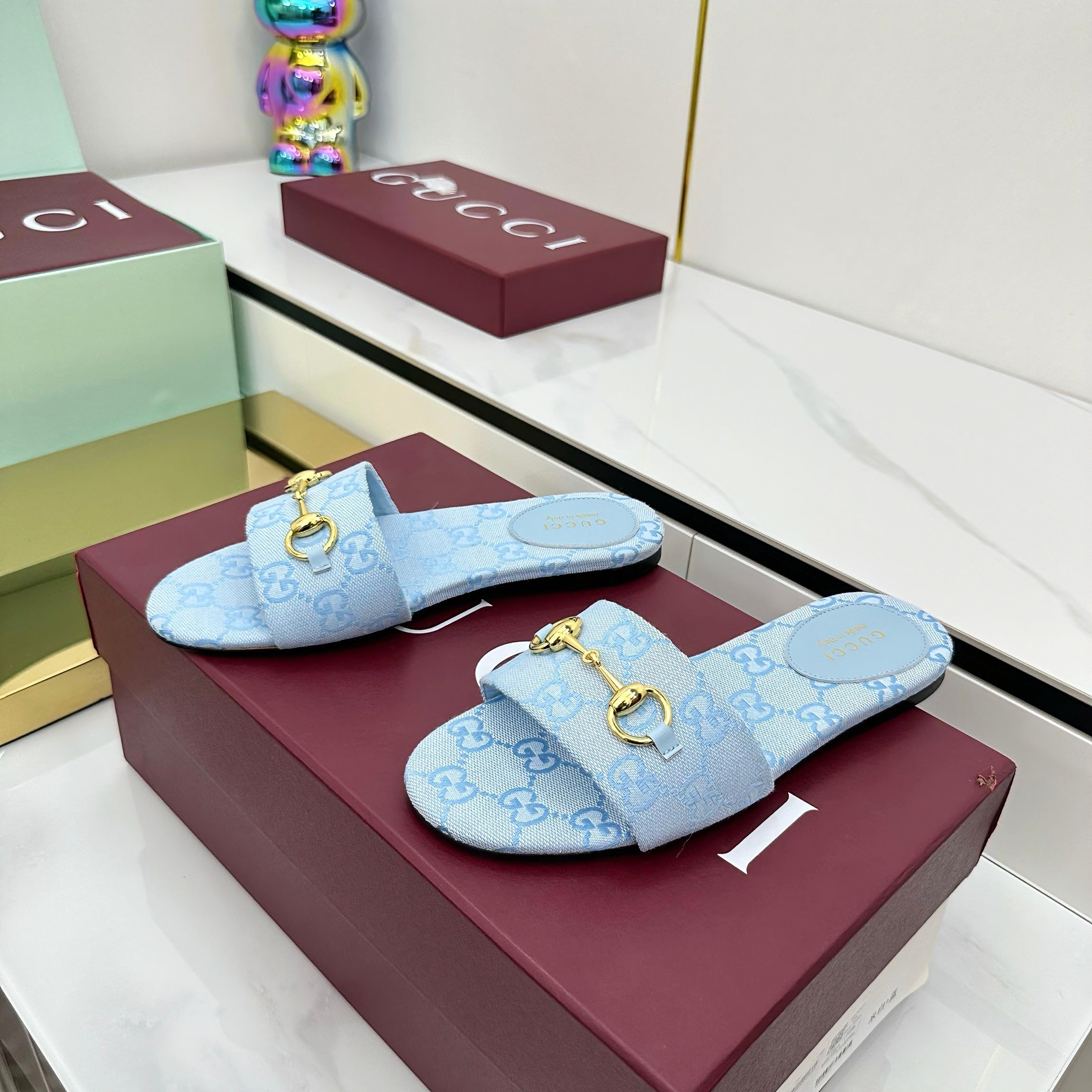GUCCI SLIDES IN BLUE WITH GOLD HARDWARE