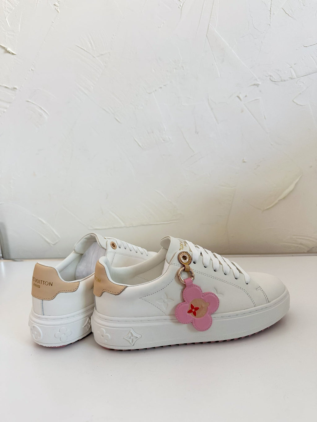 LOUIS VUITTON TIME OUT SNEAKER IN WHITE CALFSKIN