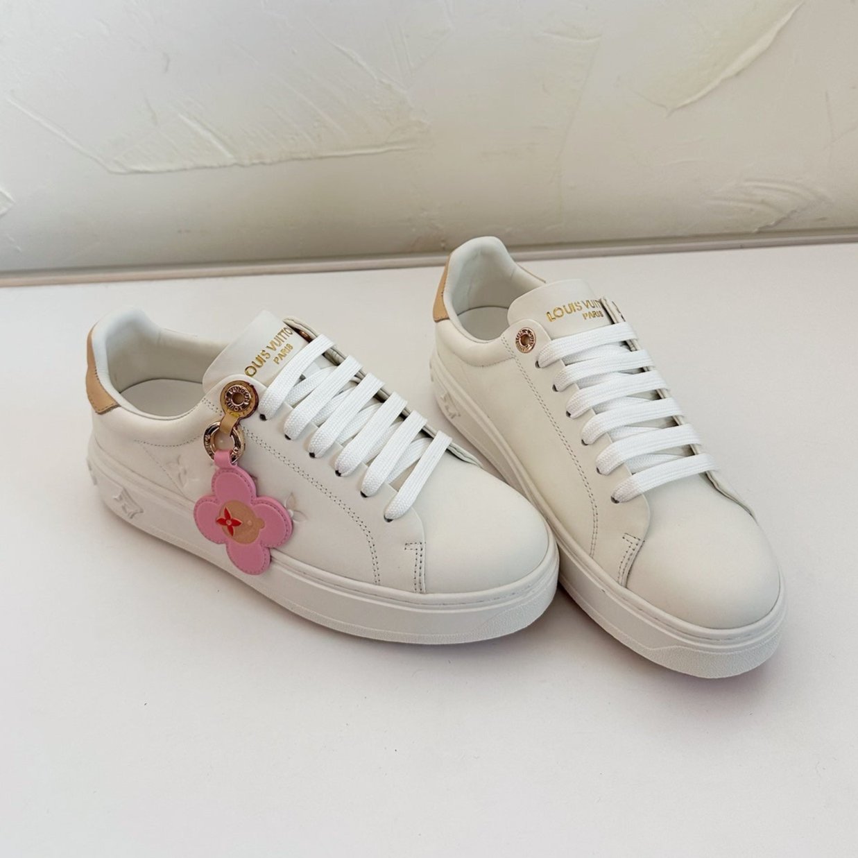 LOUIS VUITTON TIME OUT SNEAKER IN WHITE CALFSKIN