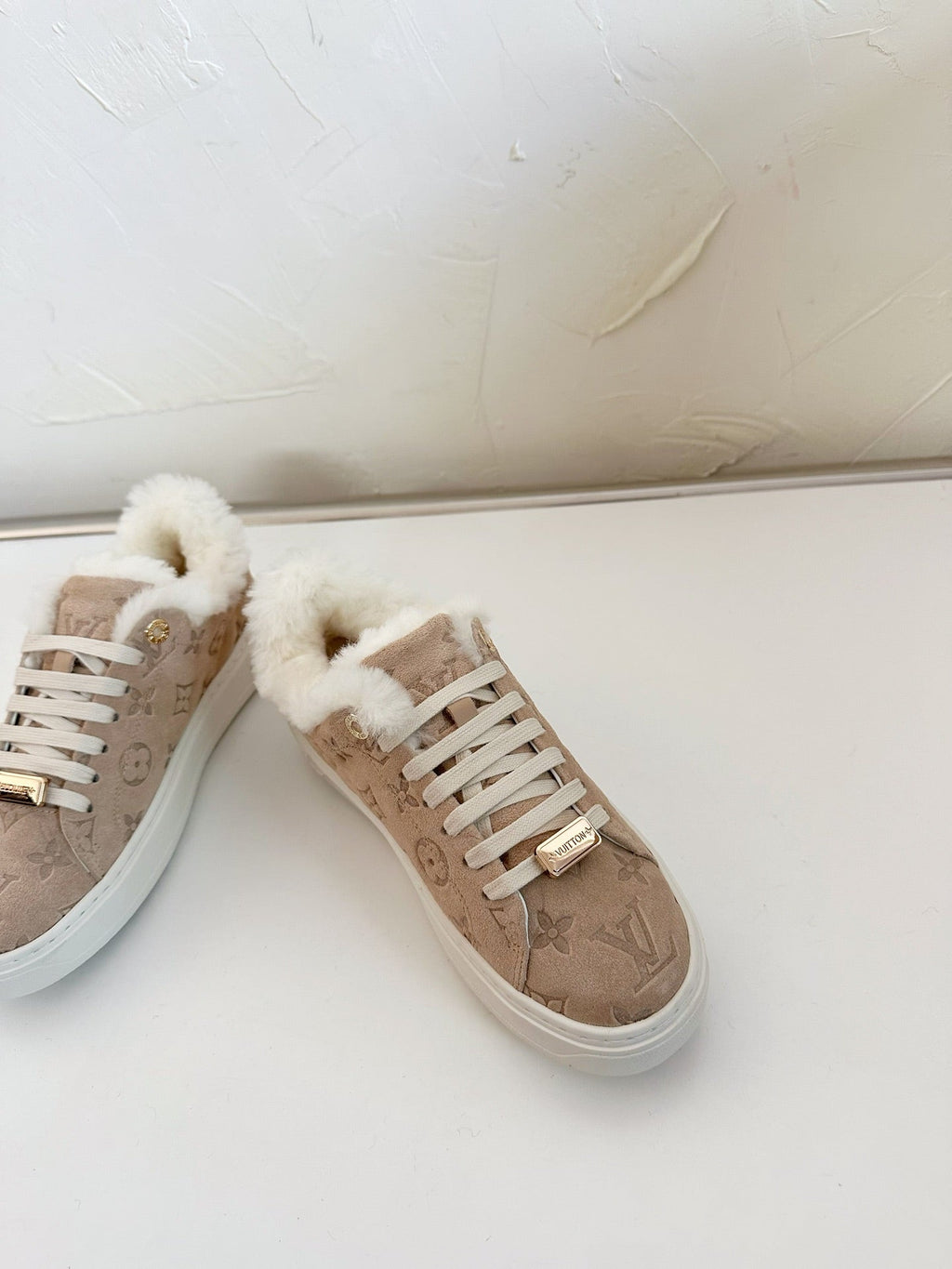LOUIS VUITTON TIME OUT SNEAKER IN DESERT BROWN MONOGRAM EMBOSSED SUEDE WITH FLEECE LINING