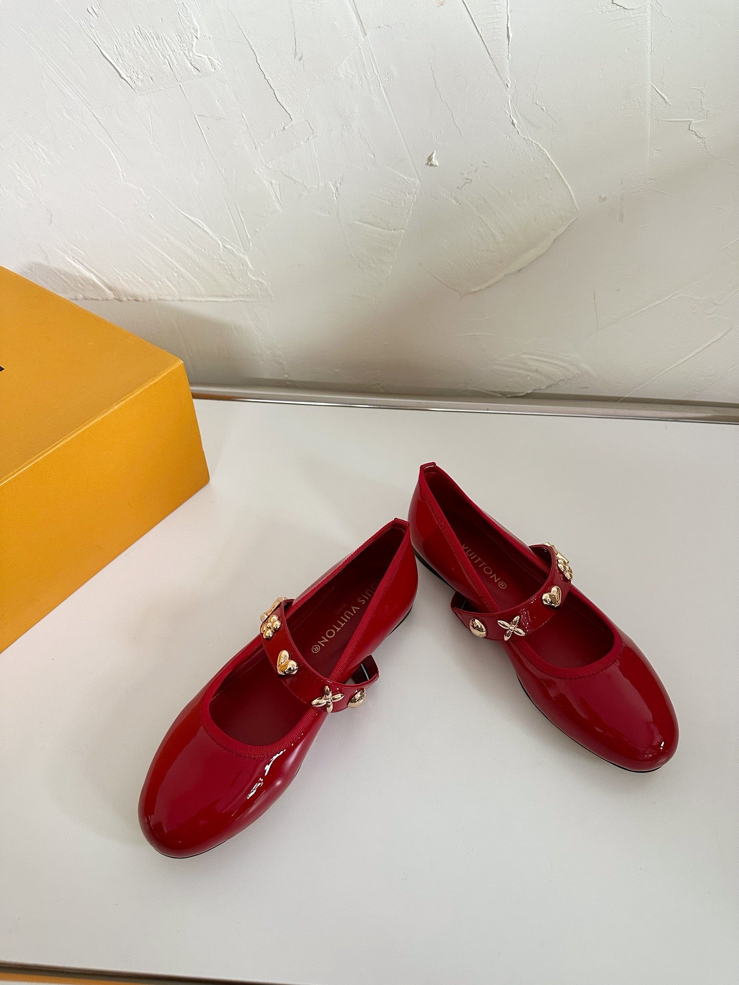 LOUIS VUITTON ROMY FLAT BALLERINA IN RUBY RED PATENT CALFSKIN