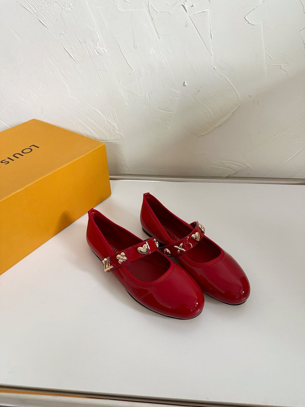 LOUIS VUITTON ROMY FLAT BALLERINA IN RUBY RED PATENT CALFSKIN