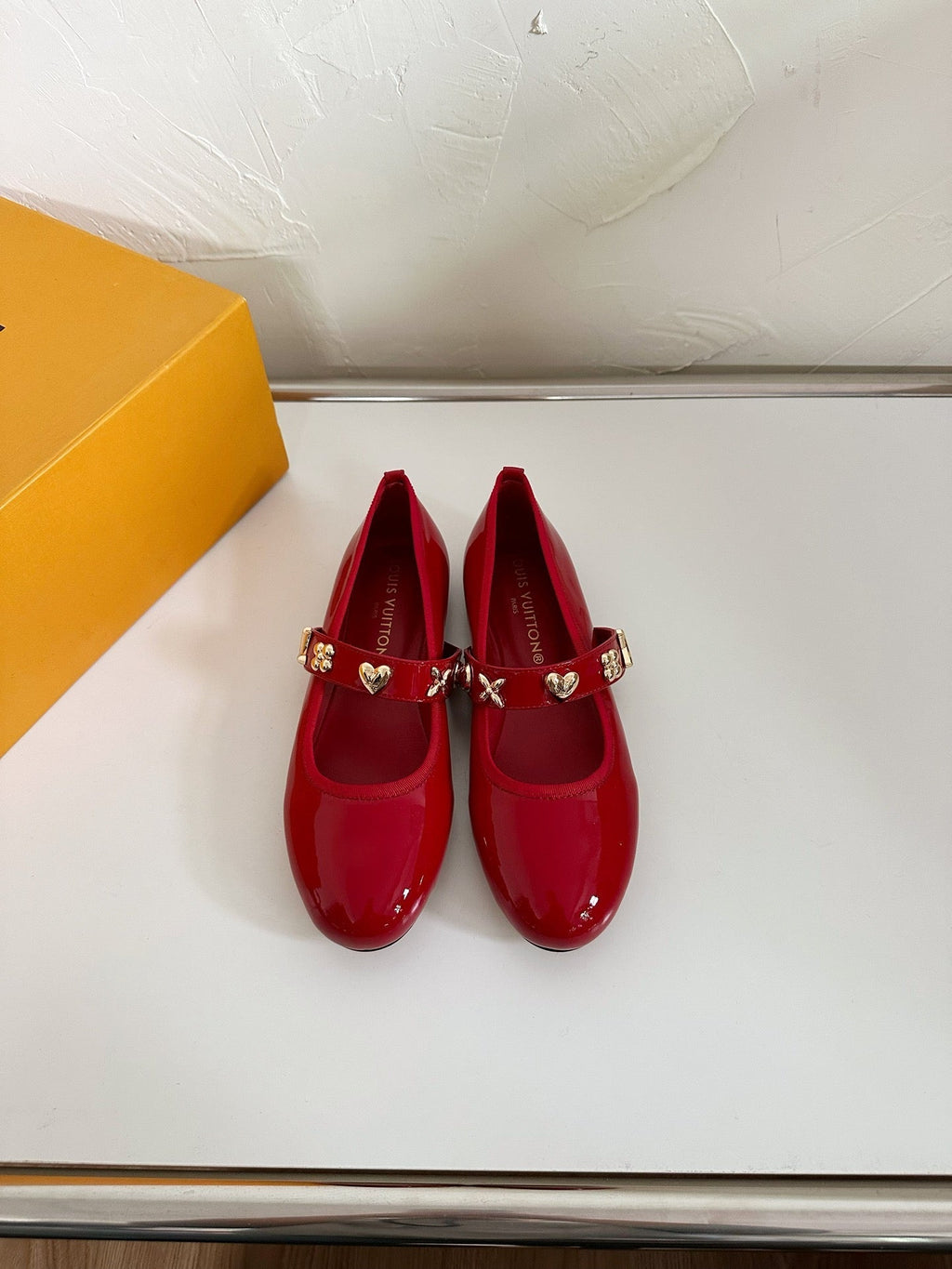 LOUIS VUITTON ROMY FLAT BALLERINA IN RUBY RED PATENT CALFSKIN