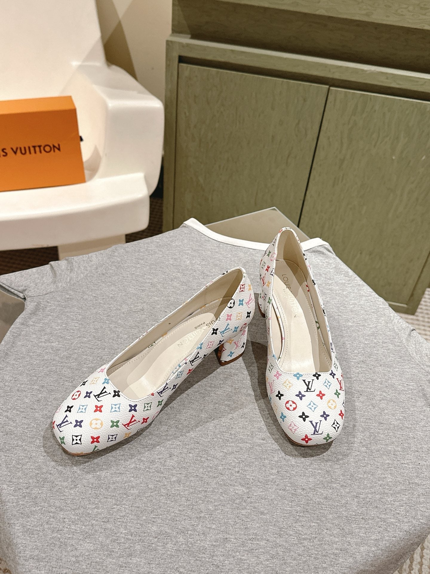 LOUIS VUITTON SWING HIGH PUMP 55 MM IN WHITE MONOGRAM CALFSKIN