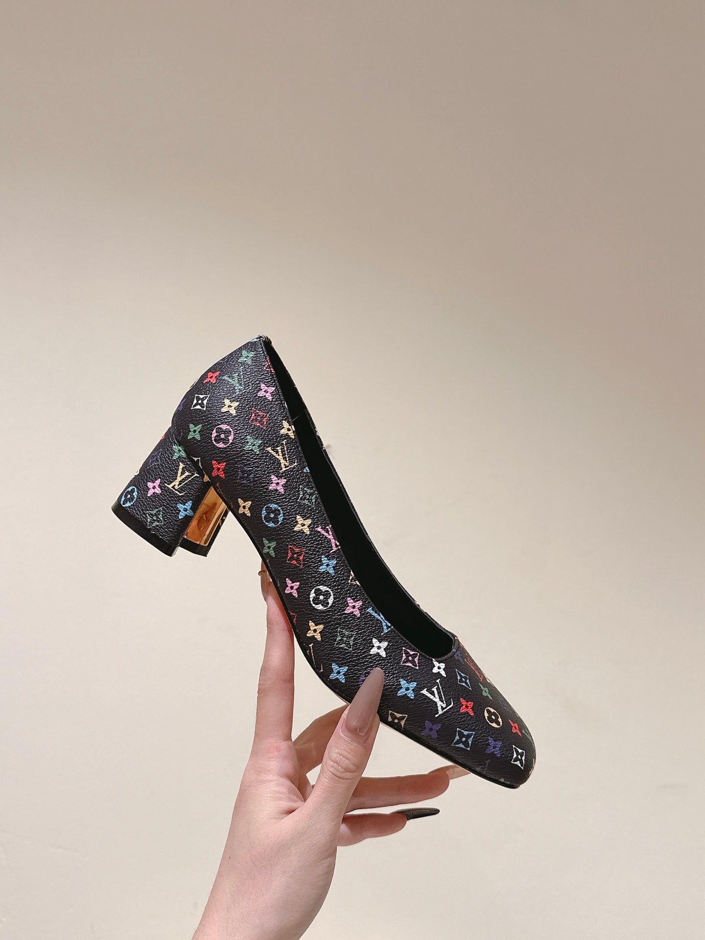 LOUIS VUITTON SWING HIGH PUMP 55 MM IN BLACK MONOGRAM CALFSKIN