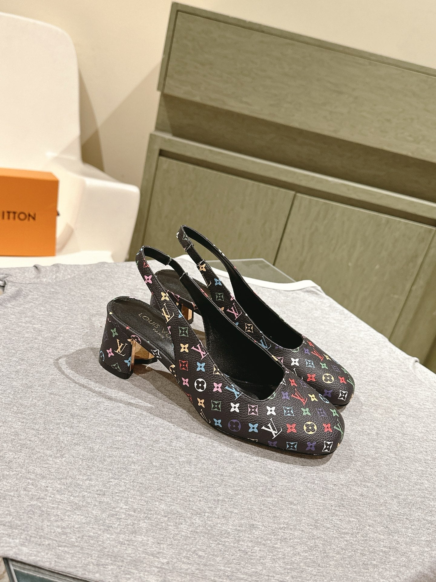 LOUIS VUITTON SWING SLINGBACK PUMP 55 MM IN BLACK MONOGRAM CALFSKIN