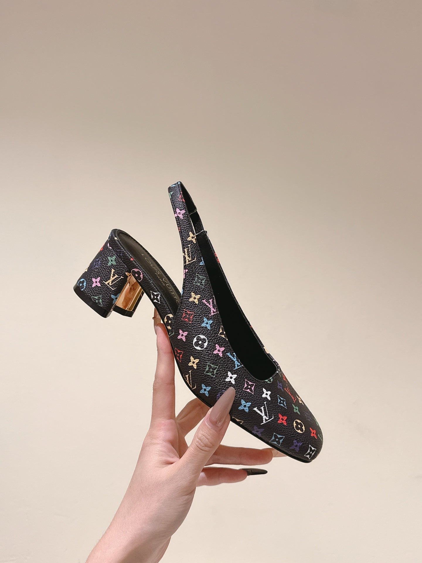 LOUIS VUITTON SWING SLINGBACK PUMP 55 MM IN BLACK MONOGRAM CALFSKIN