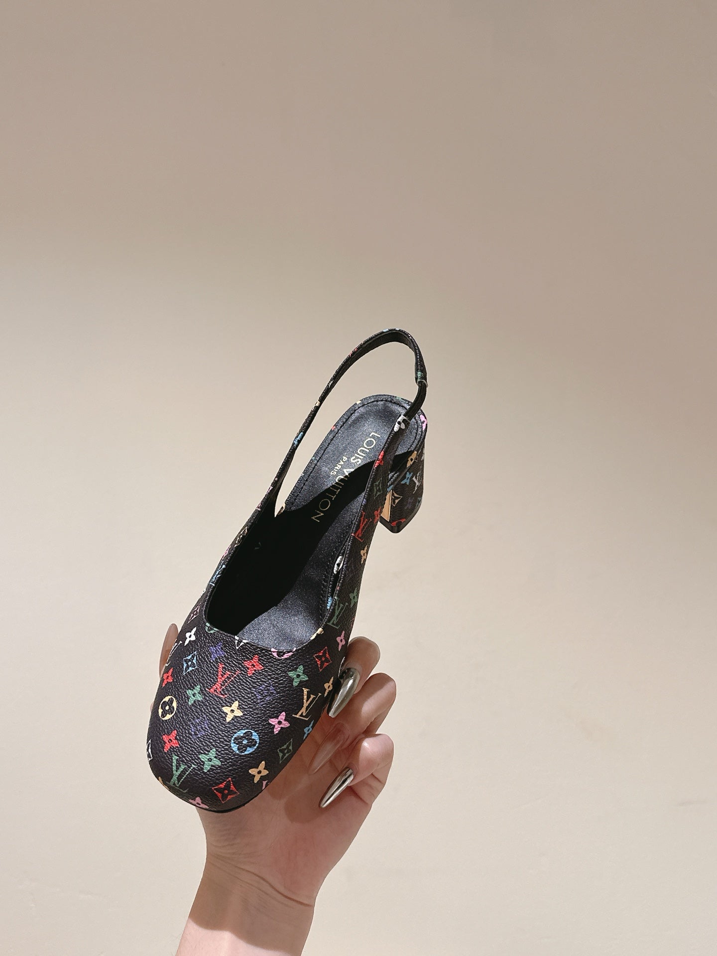 LOUIS VUITTON SWING SLINGBACK PUMP 55 MM IN BLACK MONOGRAM CALFSKIN