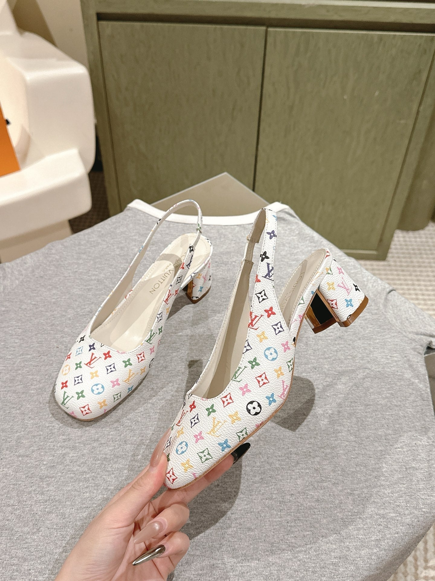 LOUIS VUITTON SWING SLINGBACK PUMP 55 MM IN WHITE MONOGRAM CALFSKIN