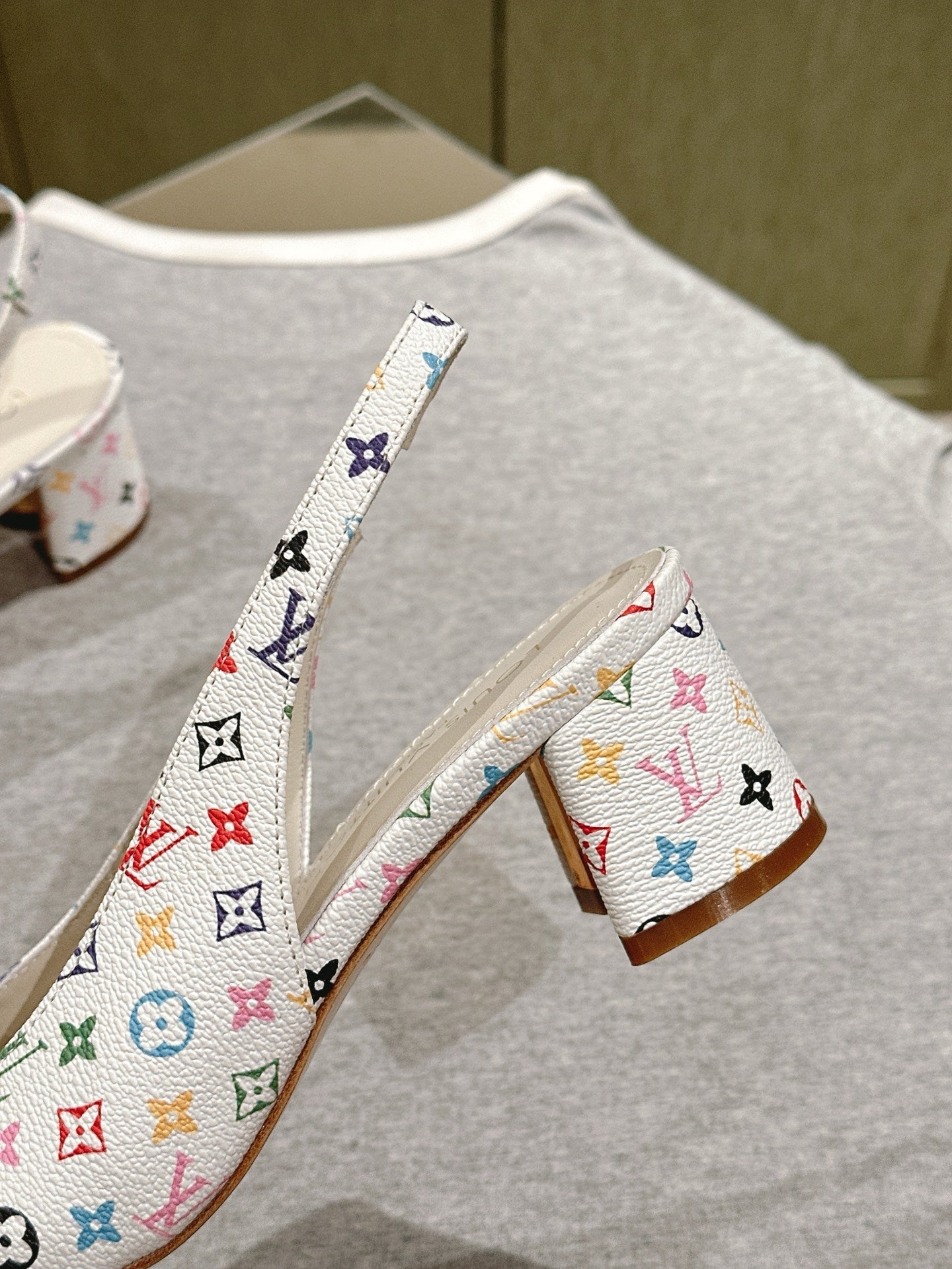 LOUIS VUITTON SWING SLINGBACK PUMP 55 MM IN WHITE MONOGRAM CALFSKIN