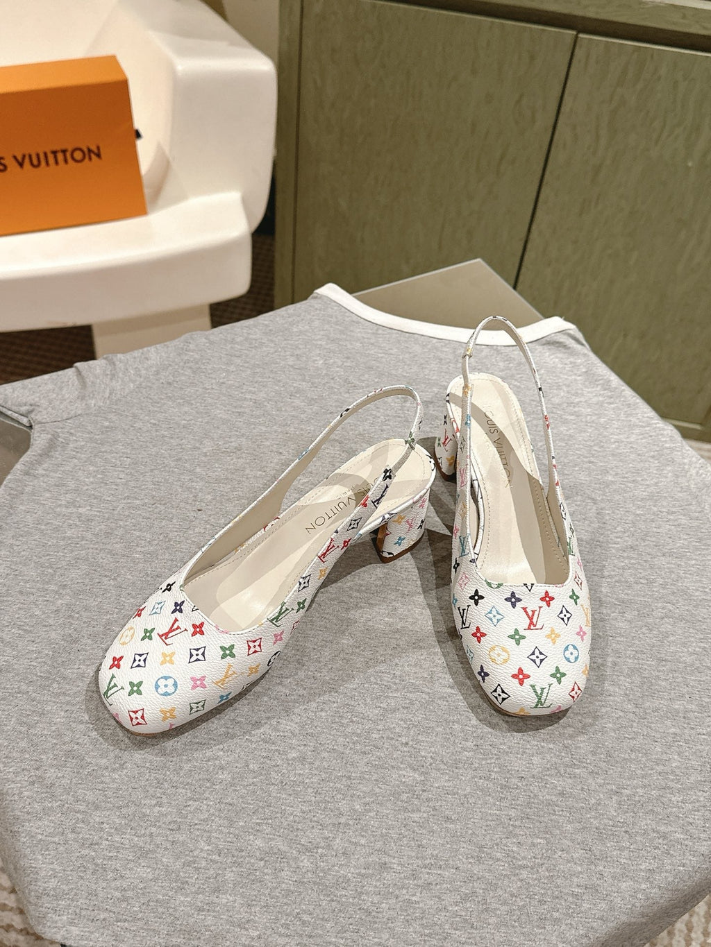 LOUIS VUITTON SWING SLINGBACK PUMP 55 MM IN WHITE MONOGRAM CALFSKIN