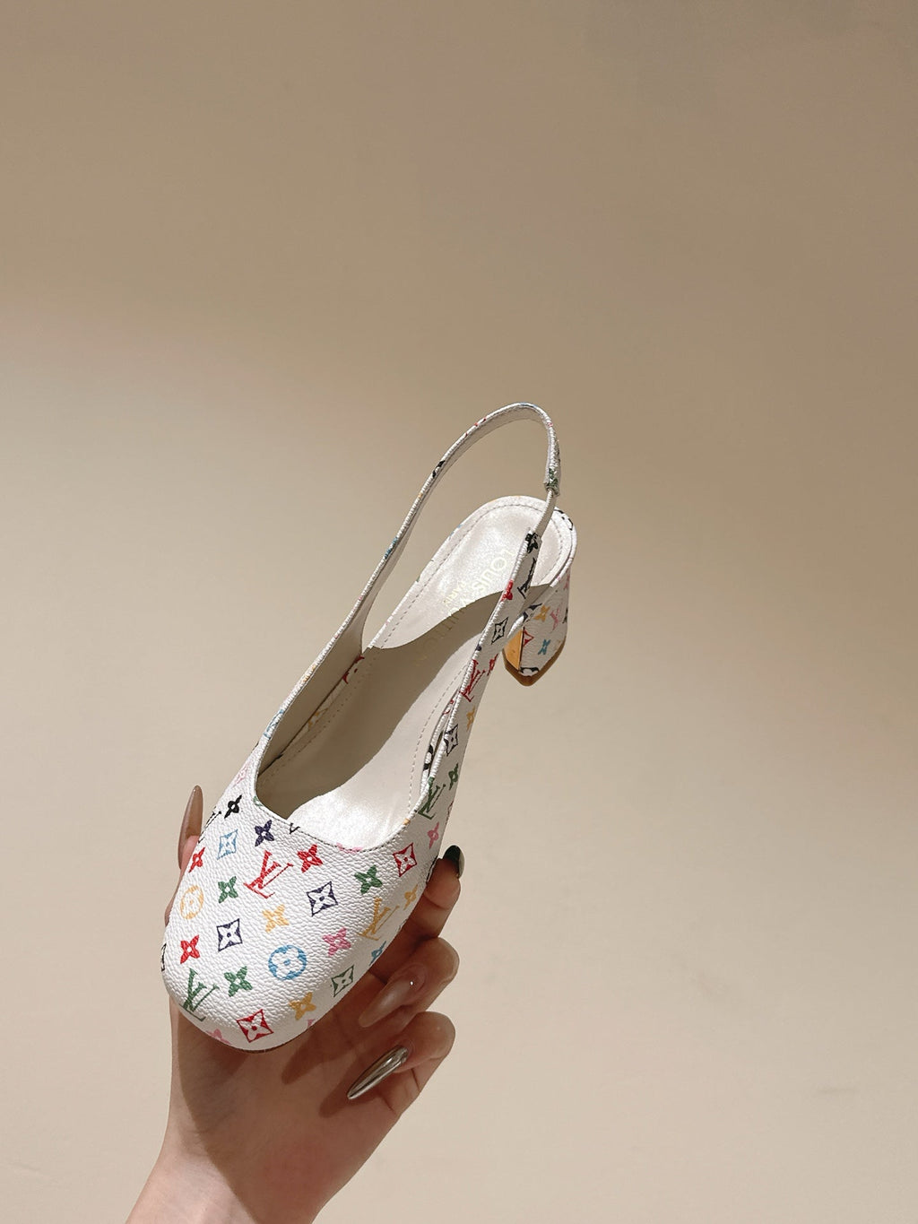 LOUIS VUITTON SWING SLINGBACK PUMP 55 MM IN WHITE MONOGRAM CALFSKIN