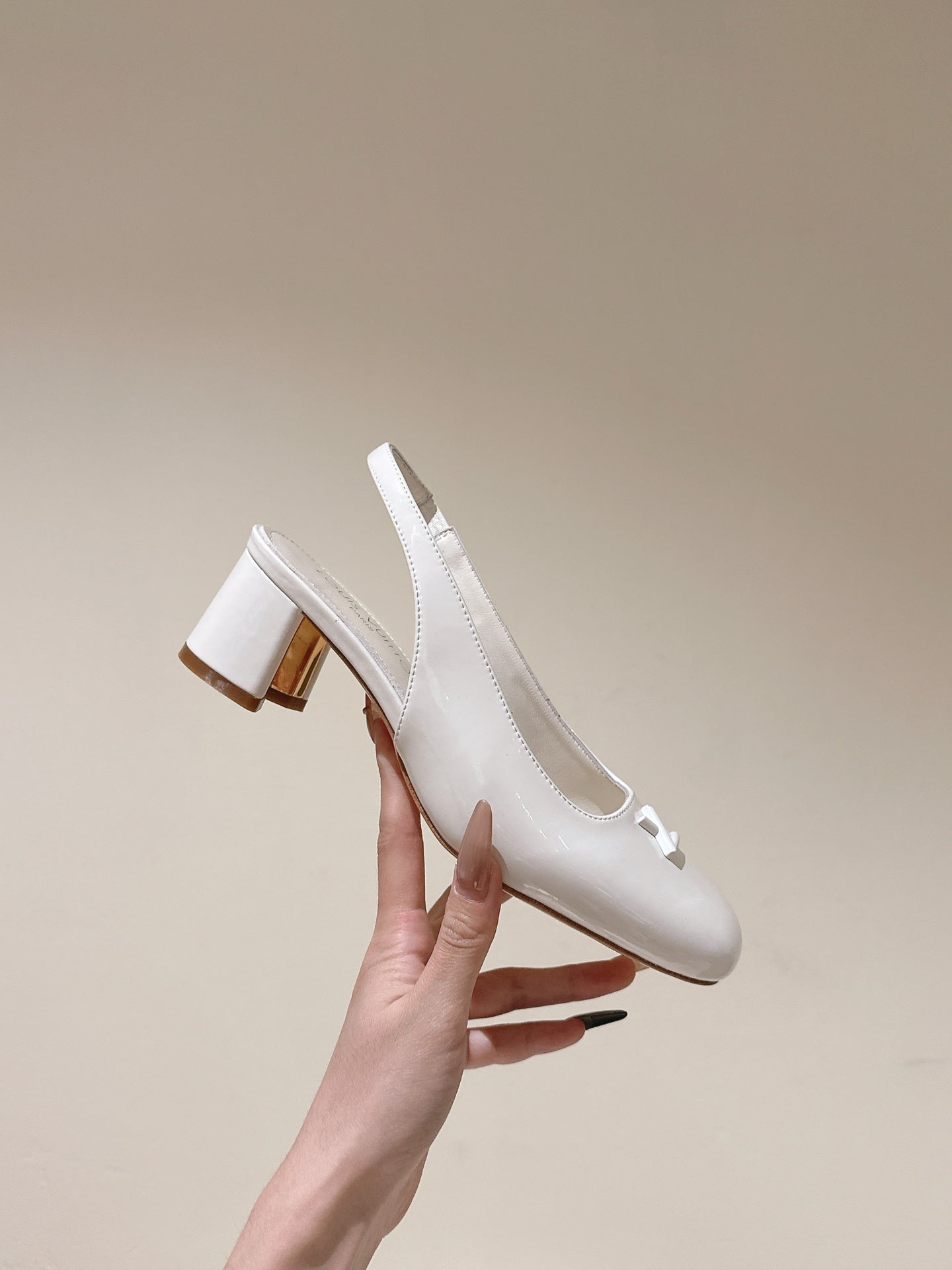 LOUIS VUITTON SWING SLINGBACK PUMP 55 MM IN WHITE PATENT CALFSKIN