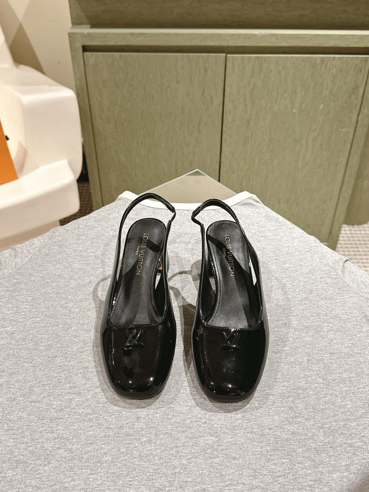 LOUIS VUITTON SWING SLINGBACK PUMP 55 MM IN BLACK PATENT CALFSKIN