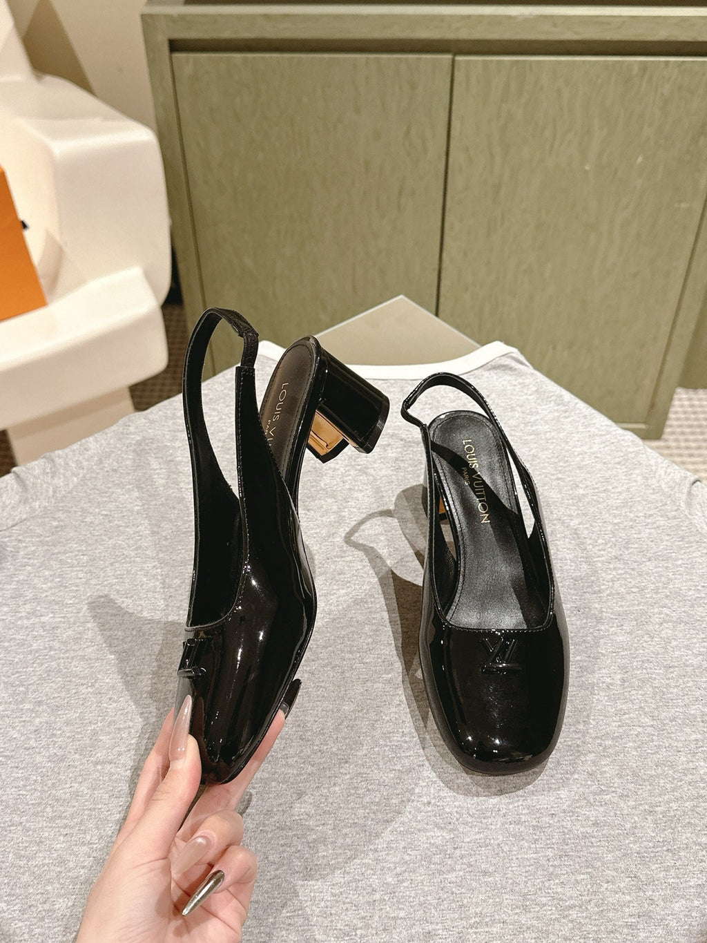 LOUIS VUITTON SWING SLINGBACK PUMP 55 MM IN BLACK PATENT CALFSKIN