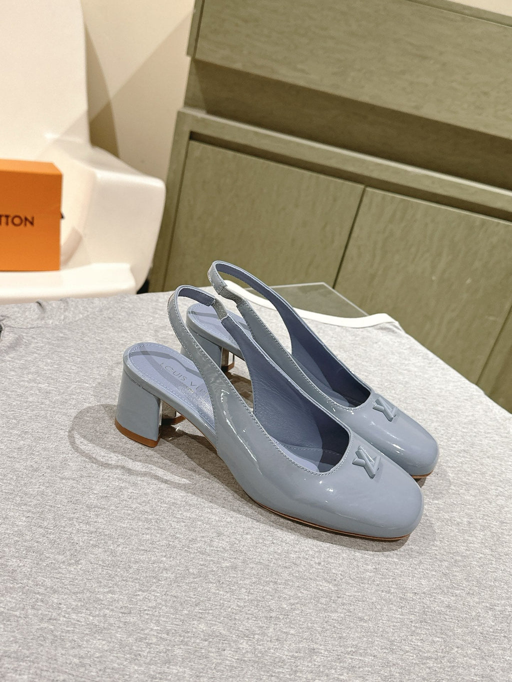 LOUIS VUITTON SWING SLINGBACK PUMP 55 MM IN ICE BLUE PATENT CALFSKIN