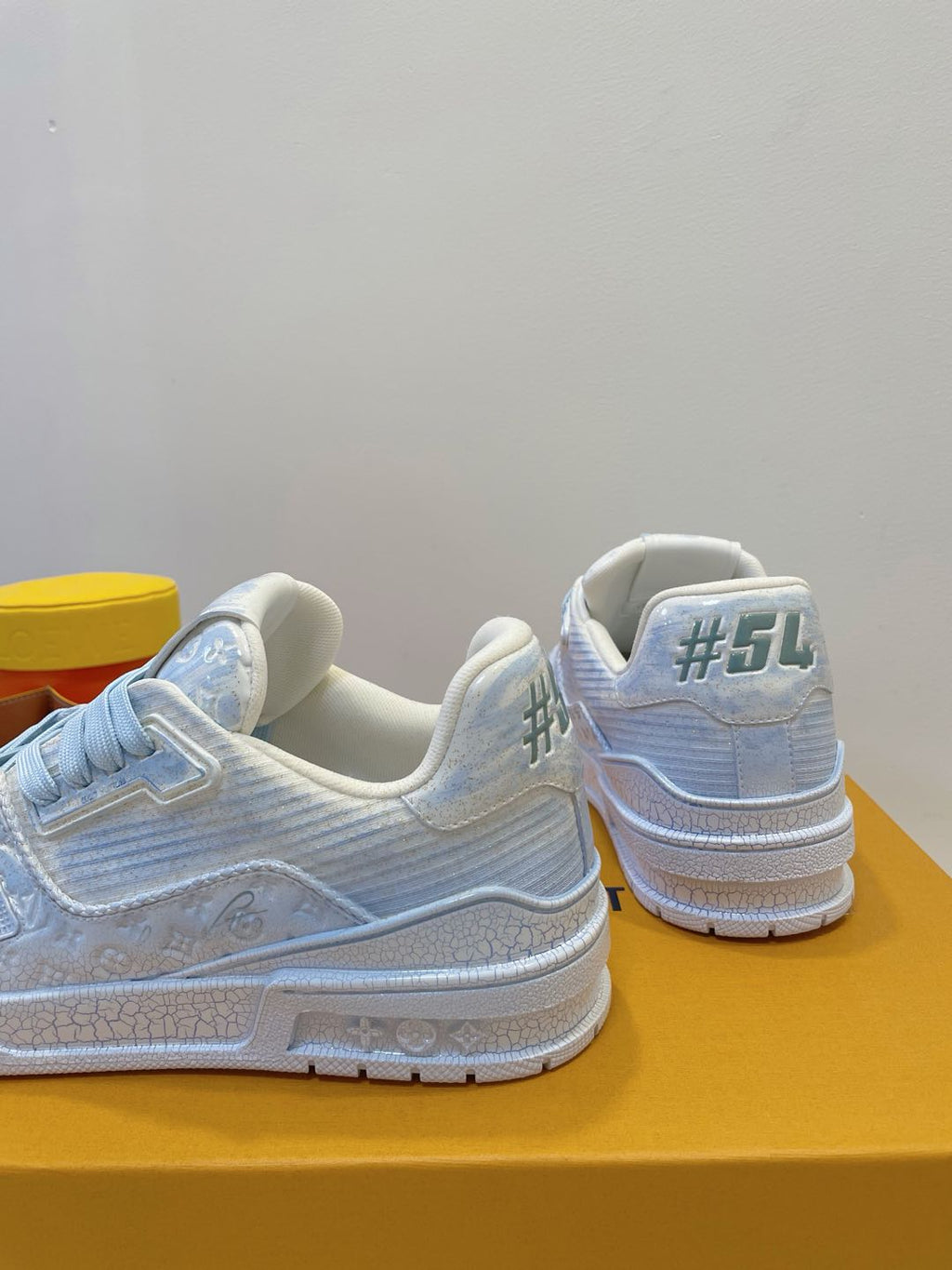 LOUIS VUITTON LV TRAINER MAXI SNEAKER IN WHITE MIX LIGHT BLUE EMBOSSED CALFSKIN