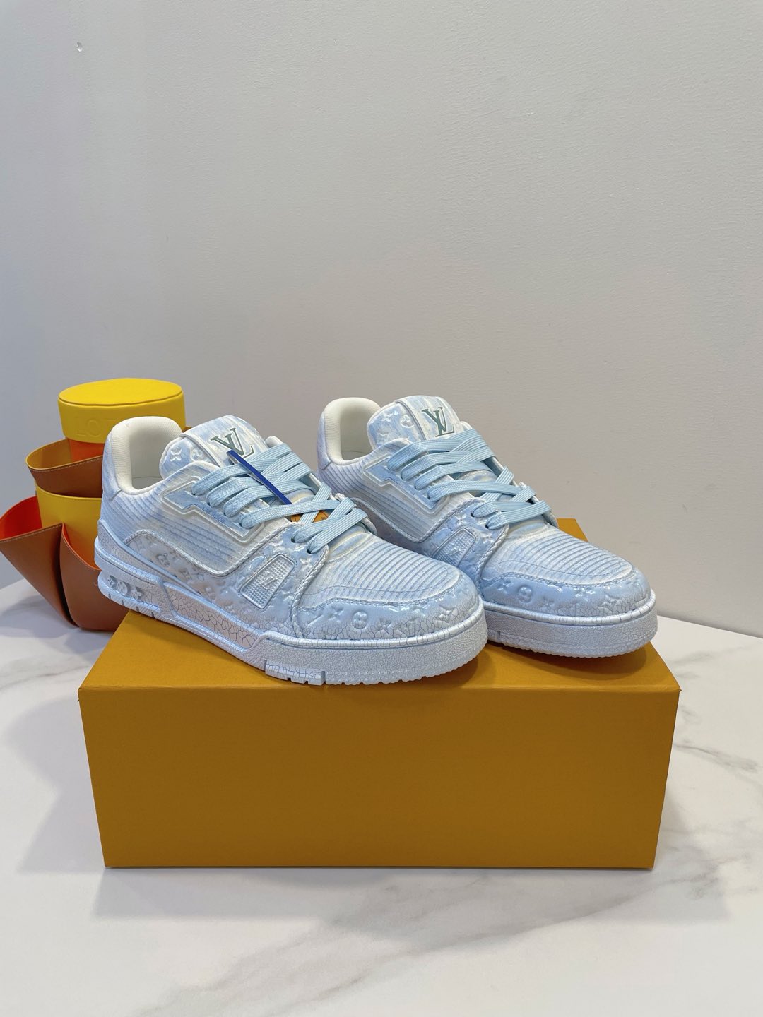 LOUIS VUITTON LV TRAINER MAXI SNEAKER IN WHITE MIX LIGHT BLUE EMBOSSED CALFSKIN