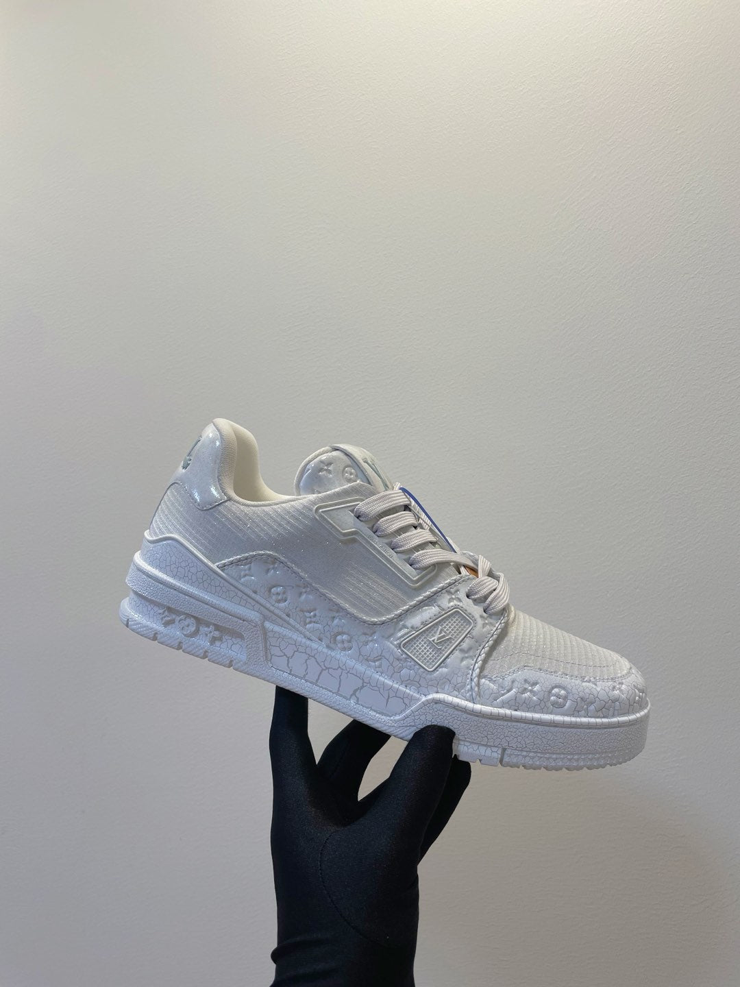 LOUIS VUITTON LV TRAINER MAXI SNEAKER IN WHITE EMBOSSED CALFSKIN