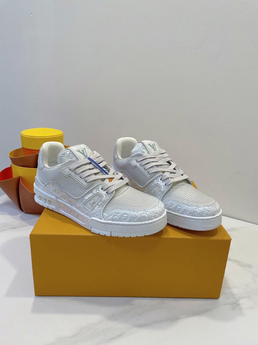 LOUIS VUITTON LV TRAINER MAXI SNEAKER IN WHITE EMBOSSED CALFSKIN