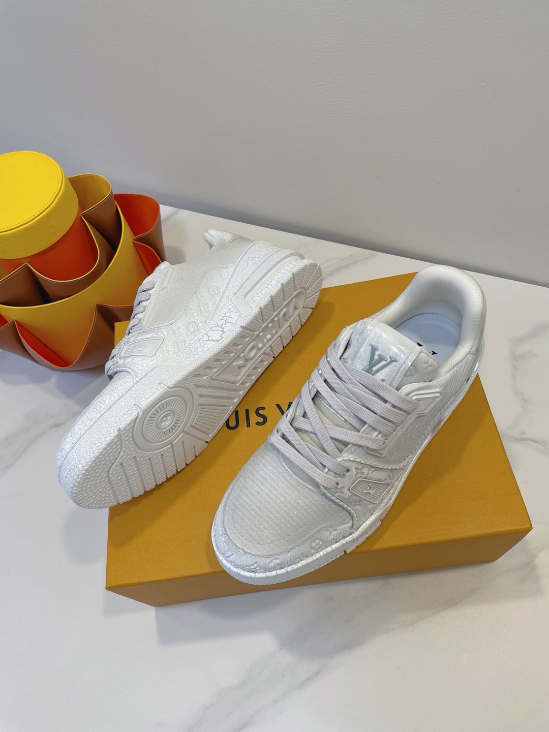 LOUIS VUITTON LV TRAINER MAXI SNEAKER IN WHITE EMBOSSED CALFSKIN