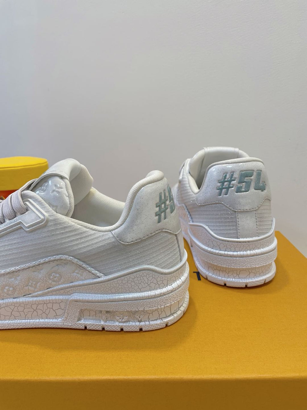 LOUIS VUITTON LV TRAINER MAXI SNEAKER IN WHITE EMBOSSED CALFSKIN
