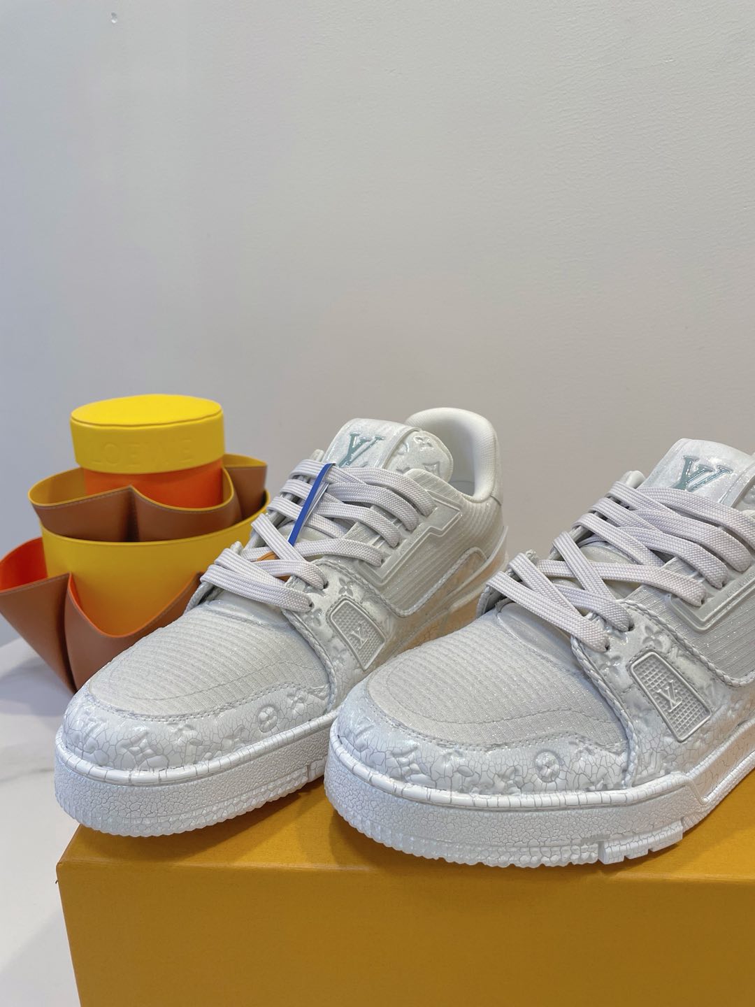 LOUIS VUITTON LV TRAINER MAXI SNEAKER IN WHITE EMBOSSED CALFSKIN