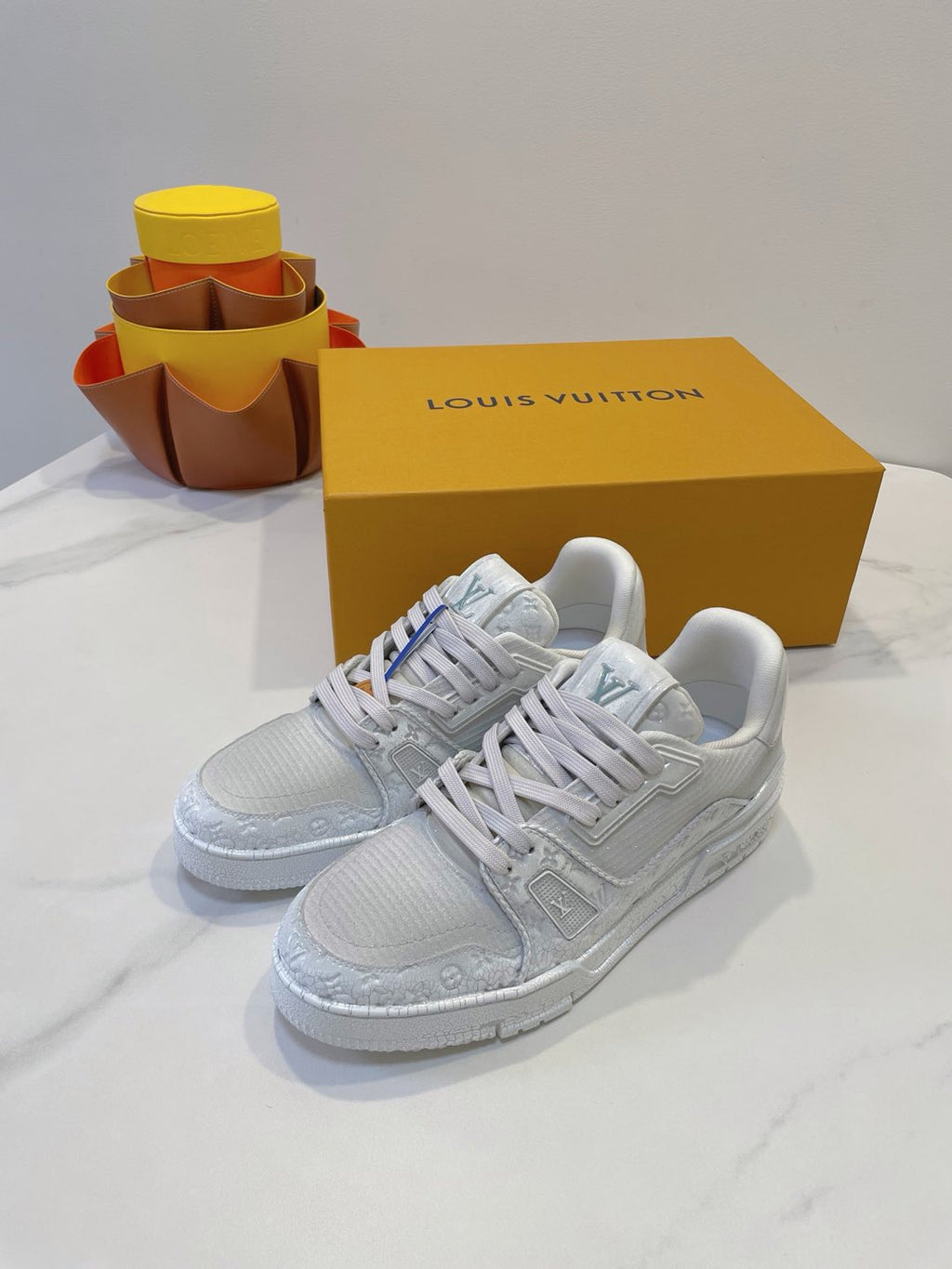 LOUIS VUITTON LV TRAINER MAXI SNEAKER IN WHITE EMBOSSED CALFSKIN