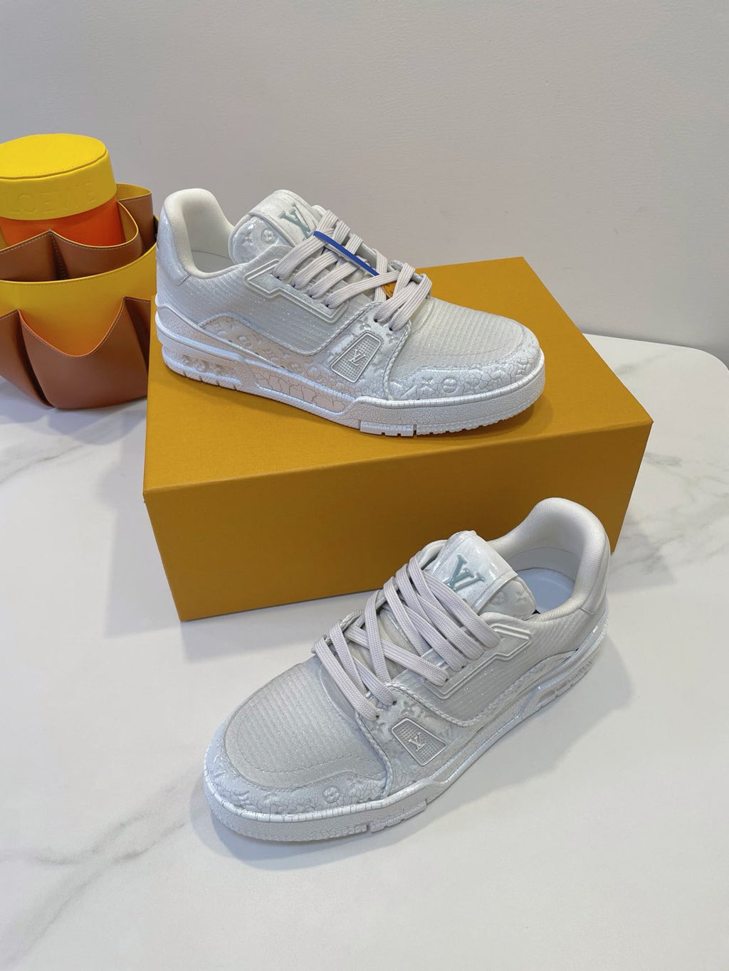 LOUIS VUITTON LV TRAINER MAXI SNEAKER IN WHITE EMBOSSED CALFSKIN